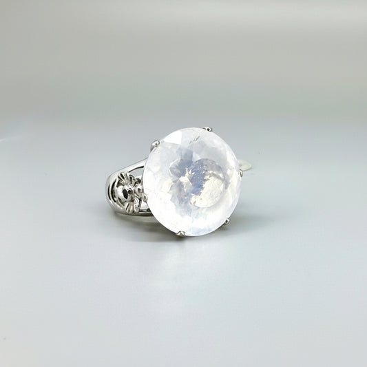 Handcrafted white gold-plated silver ring featuring a large 26.47 ct faceted white quartz gemstone.
