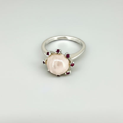 Handcrafted ring with 4.02 ct rose quartz and 0.23 ct rubies set in white-gold-plated sterling silver.