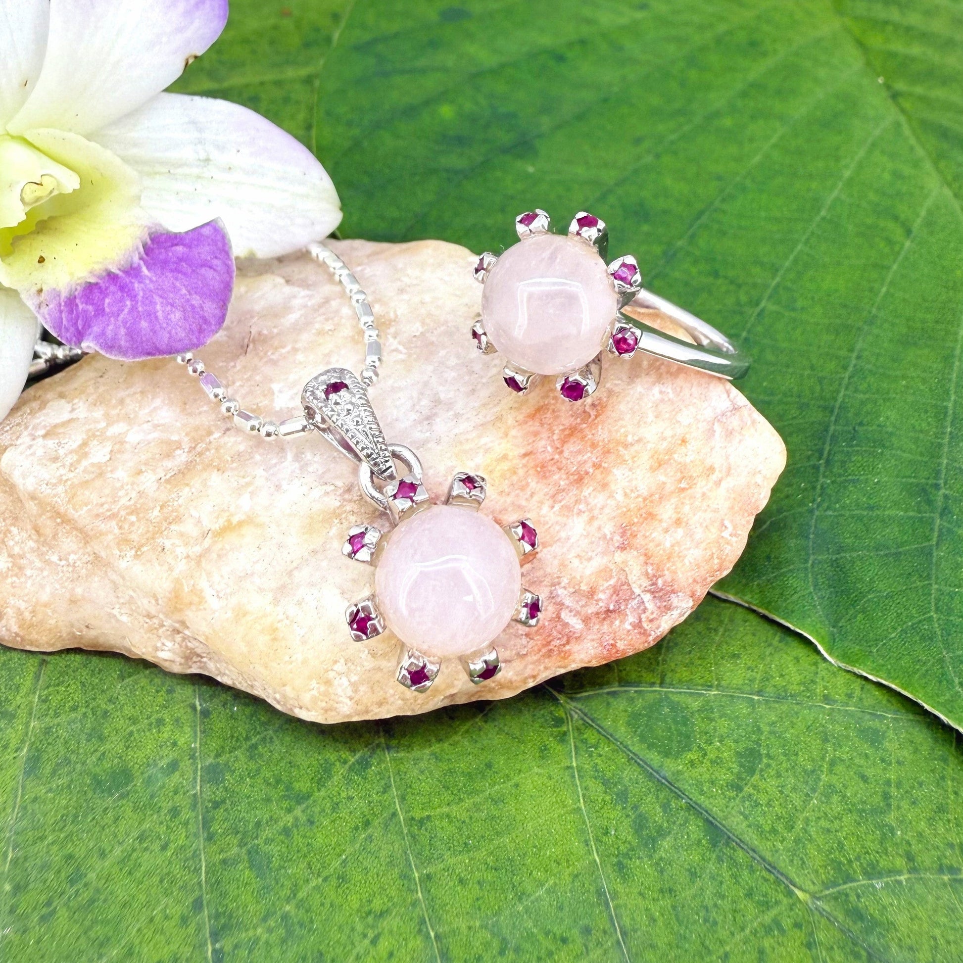 Handcrafted ring with 4.02 ct rose quartz and 0.23 ct rubies set in white-gold-plated sterling silver.