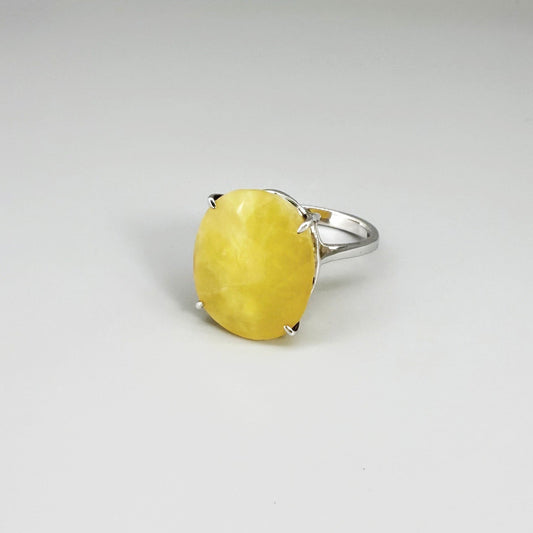 Yellow opal ring in white gold plated sterling silver, featuring a smooth natural gemstone with soft glow, elegant and refined design.