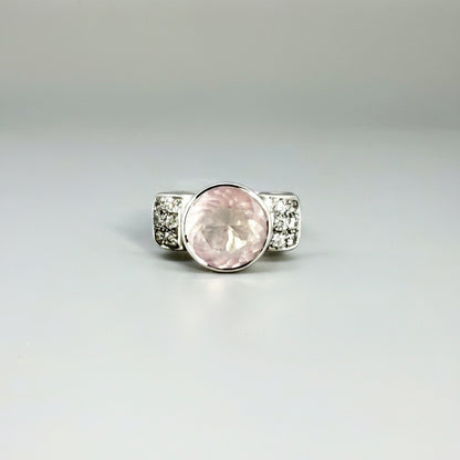 Rose quartz and CZ ring in white gold plated sterling silver, featuring a natural pink gemstone with clear sparkling accents, elegant and feminine design.