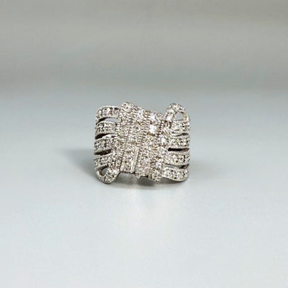 Wide band cubic zirconia ring in white gold plated sterling silver, featuring clear brilliant stones for a radiant, timeless sparkle.