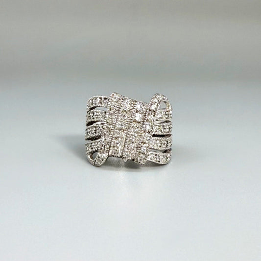 Wide band cubic zirconia ring in white gold plated sterling silver, featuring clear brilliant stones for a radiant, timeless sparkle.