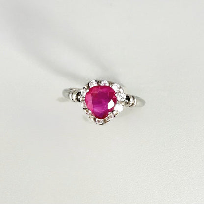 Ruby and CZ ring in white gold plated sterling silver, featuring a vivid red natural ruby with sparkling cubic zirconia accents, elegant and timeless design.