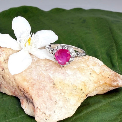 Ruby and CZ ring in white gold plated sterling silver, featuring a vivid red natural ruby with sparkling cubic zirconia accents, elegant and timeless design.
