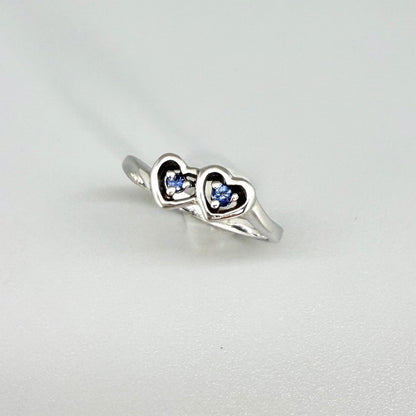 Delicate sapphire ring in white gold plated sterling silver, featuring natural blue gemstones in a graceful setting, elegant and timeless design.
