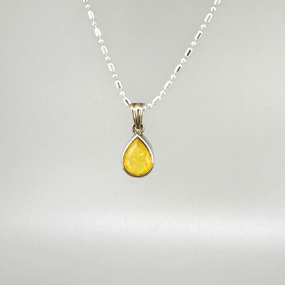 Handmade white gold plated silver pendant with 14.76 ct rose quartz and cubic zirconia accents, elegant and refined design.